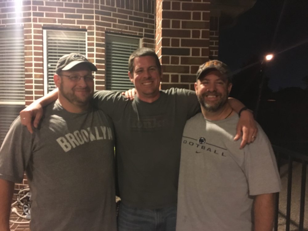 Kevin with his college roommates
