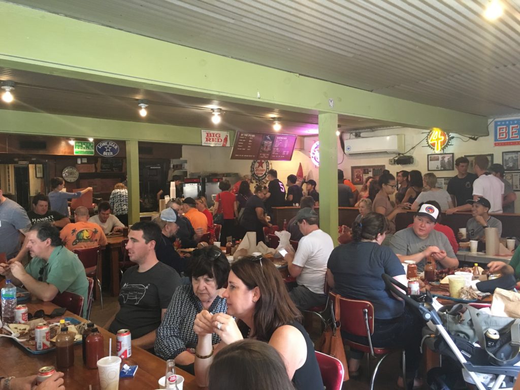 The inside of crowded Franklin Barbecue.