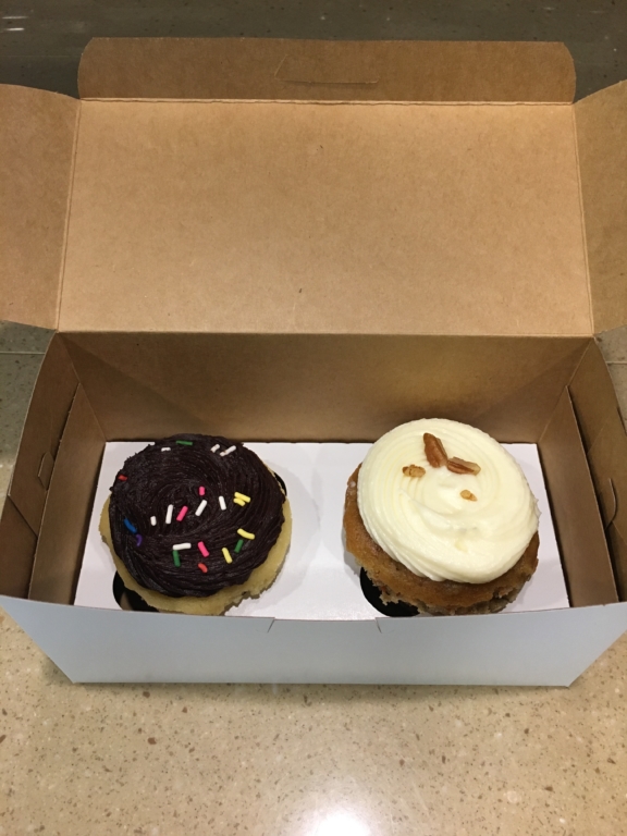 Two cupcakes in a box.