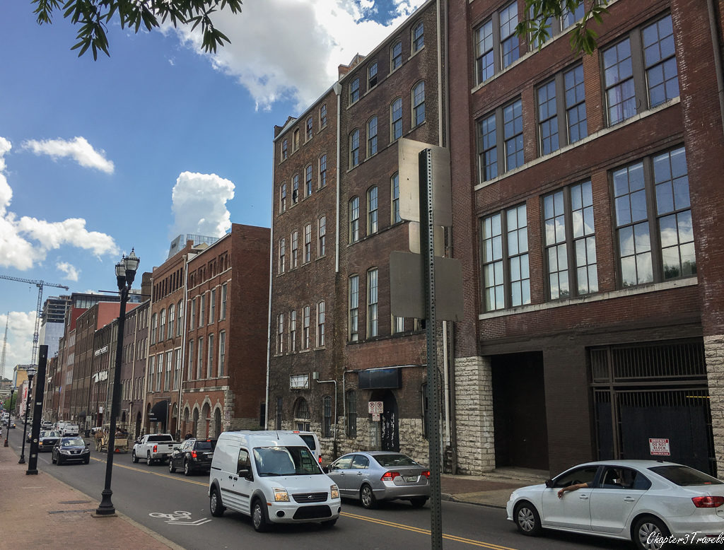 A row of buildings across the street from the river in Nashville, Tennessee.