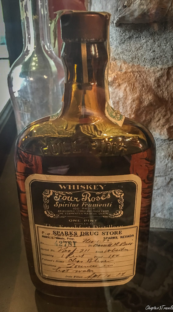 Bottle of Four Roses Bourbon with prescription sticker affixed to it.