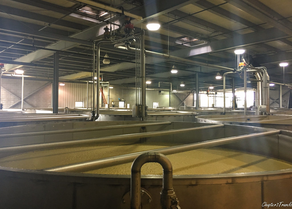 Large stainless steel fermentation vats at Wild Turkey distillery