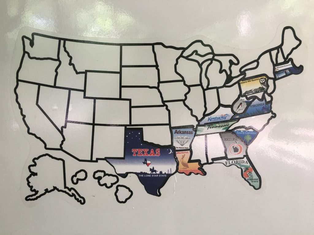 An RV sticker map with 14 states visited