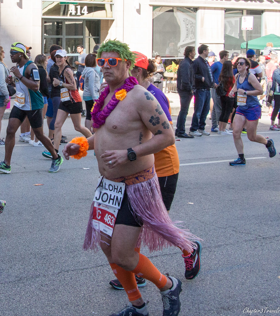 A runner in a grass skirt