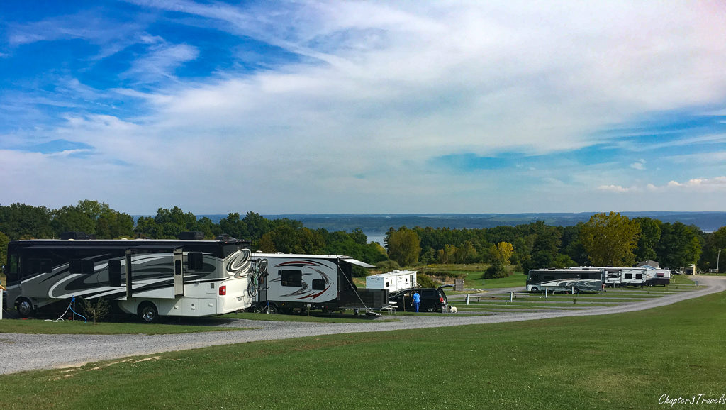 RVs parked parallel to one another at the top and bottom of a hill