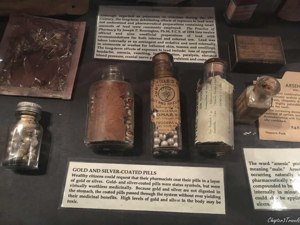 Exhibit about gold and silver coated pills at the Pharmacy Museum in New Orleans