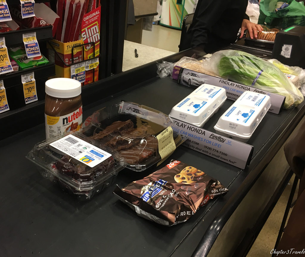 Nutella, Chocolate frosted brownies, chocolate chips, and beets at grocery store