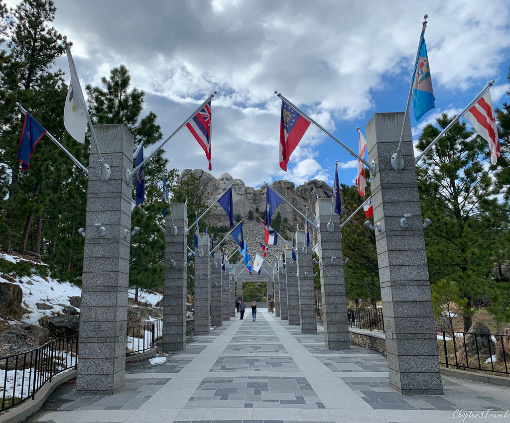 The flag decorated promenade that leads to Mount Rushmore in South Dakota