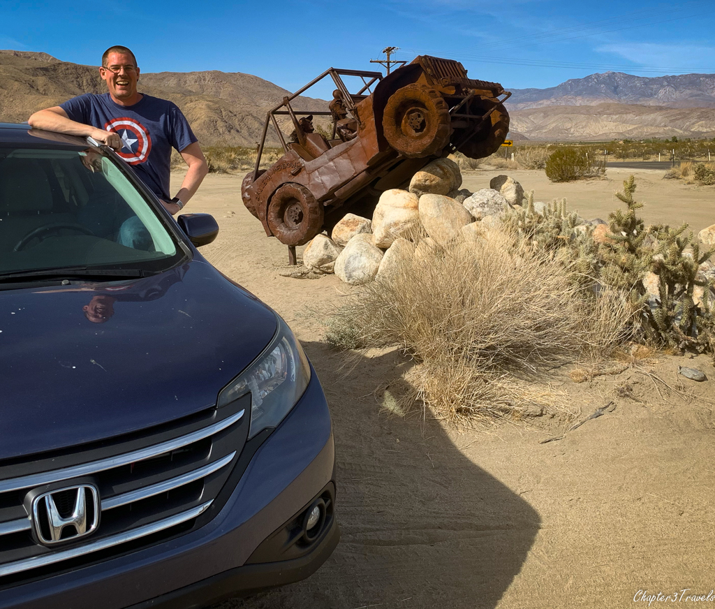 Kevin in CR-V in front of Jeep sculpture in Borrego Springs