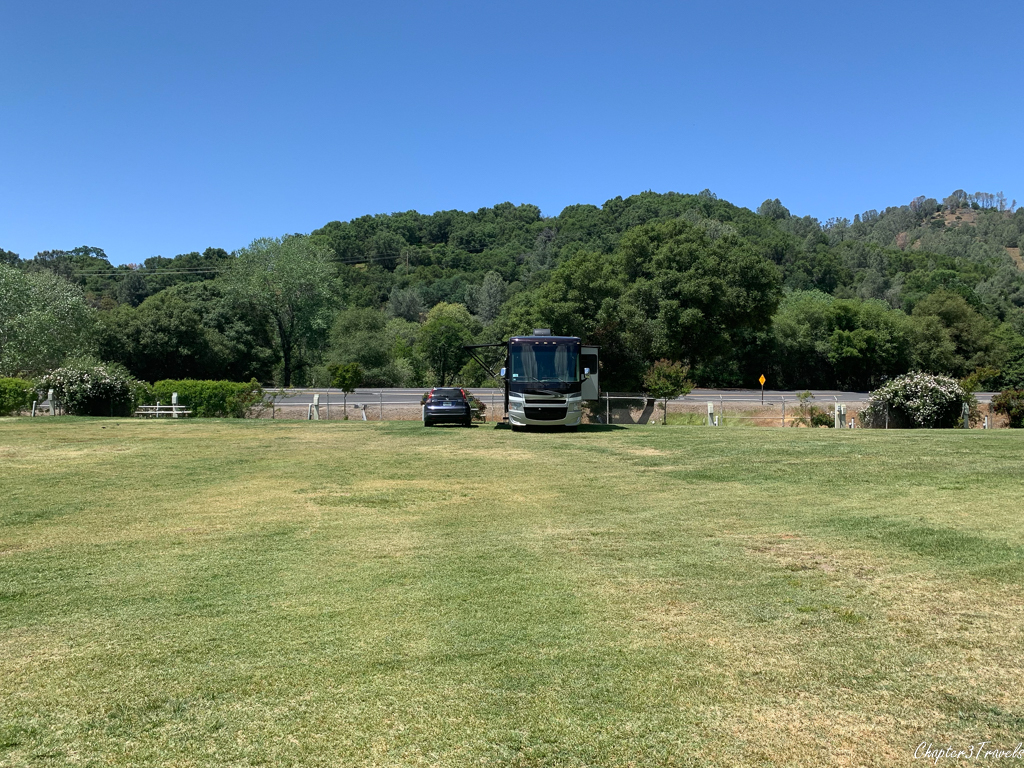 Large grassy area with campsites at Mariposa County Fairgrounds