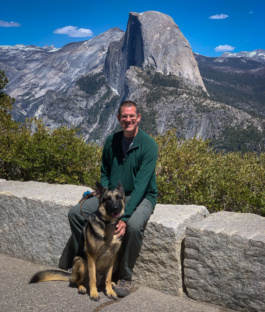 Kevin and Thor sitting in front of Half Dome