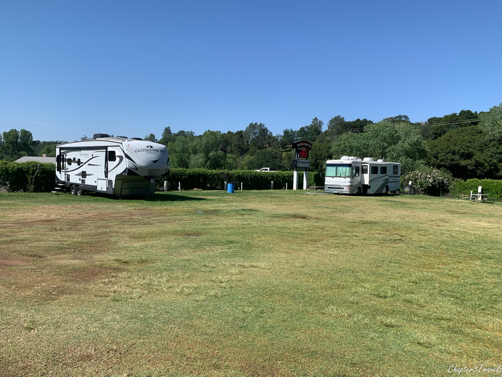 Large grassy area with campsites at Mariposa County Fairgrounds
